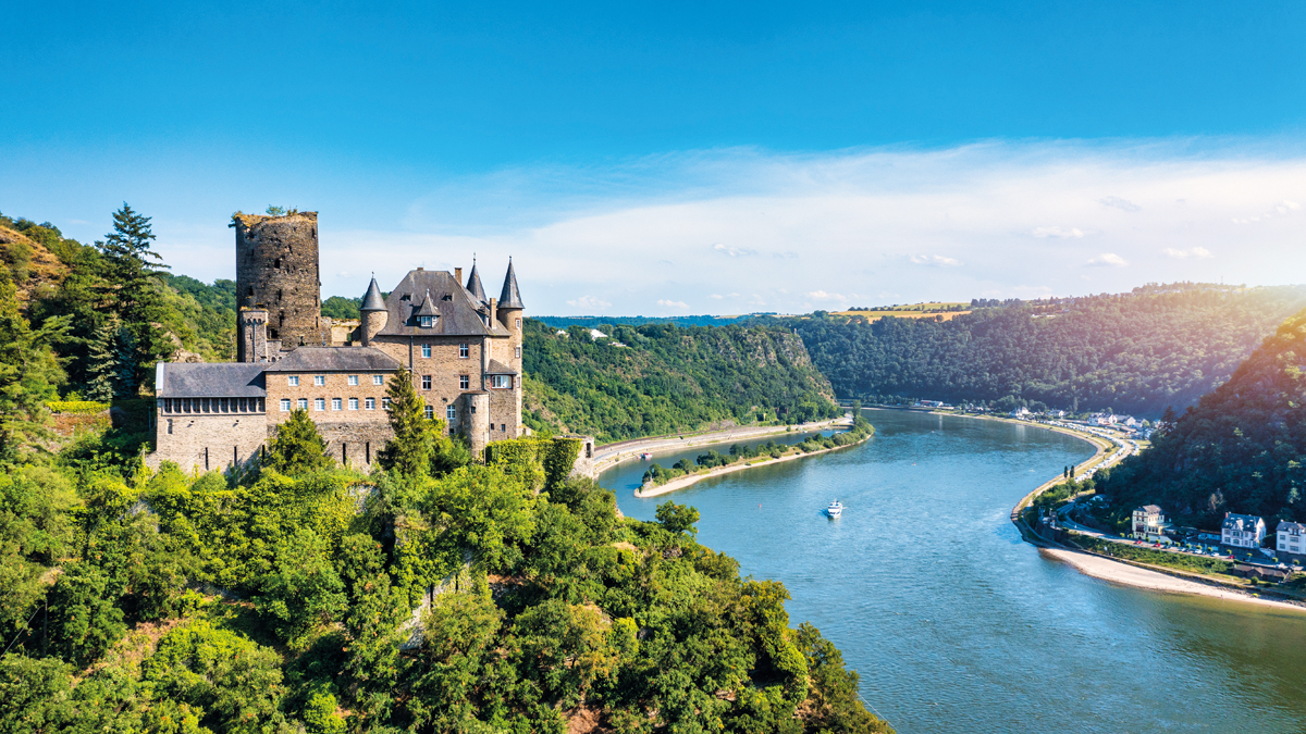 Katz castle and romantic Rhine in summer at sunset, Germany. Katz Castle or Burg Katz is a castle ruin above the St. Goarshausen town in Rhineland-Palatinate region, Germany